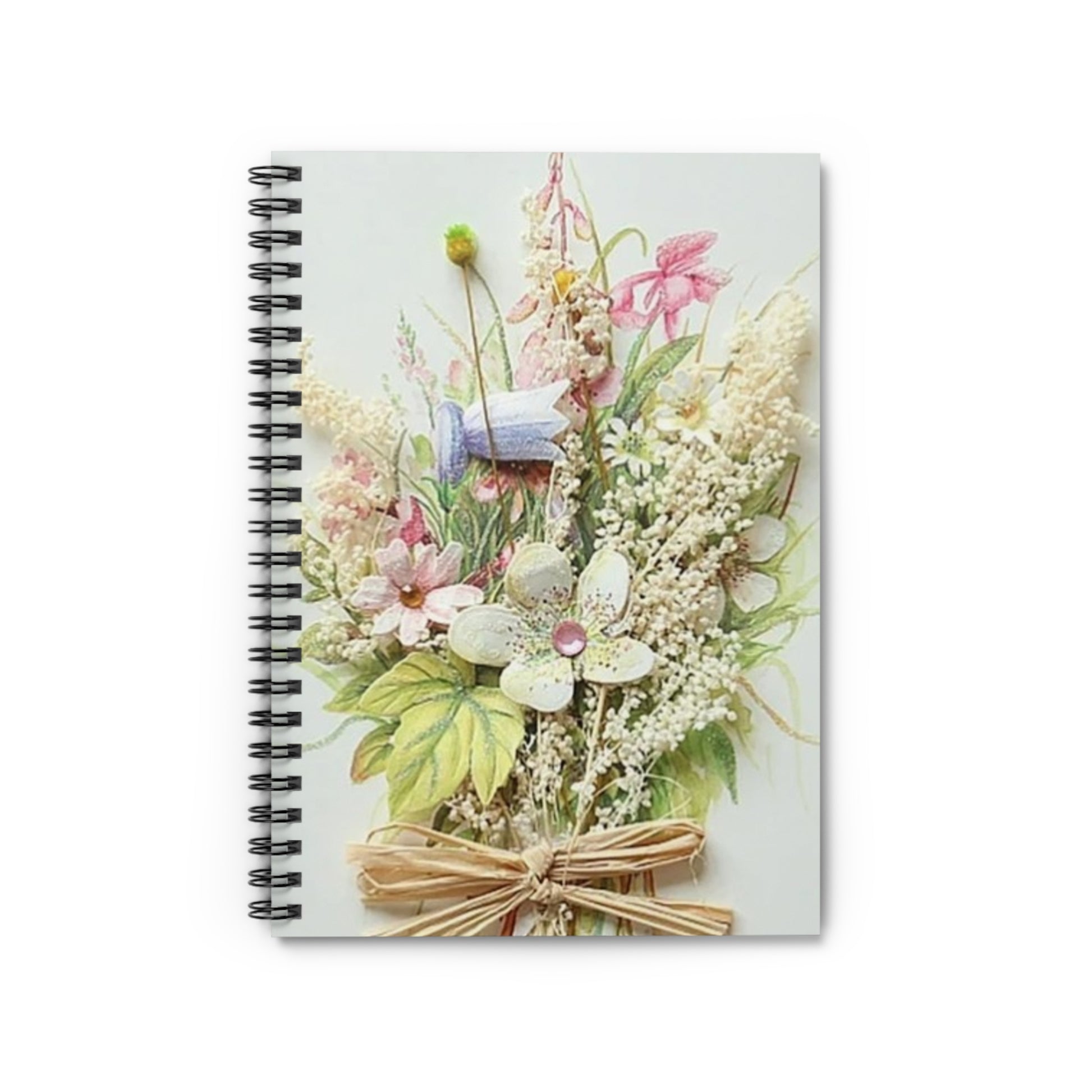 Notebook with floral design on a white background