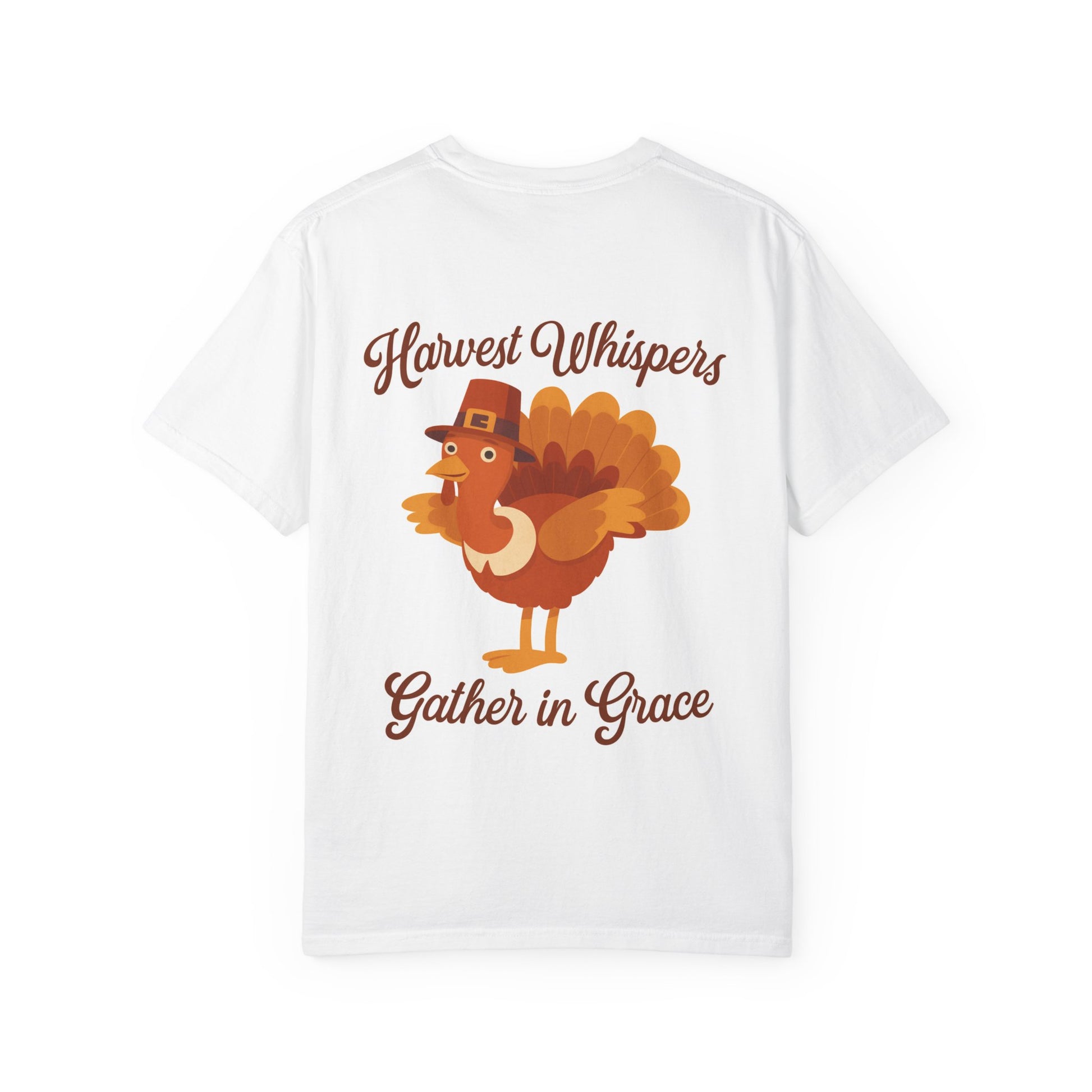 White t-shirt with a turkey graphic and text 'Harvest Whispers Gather in Grace' on a white background