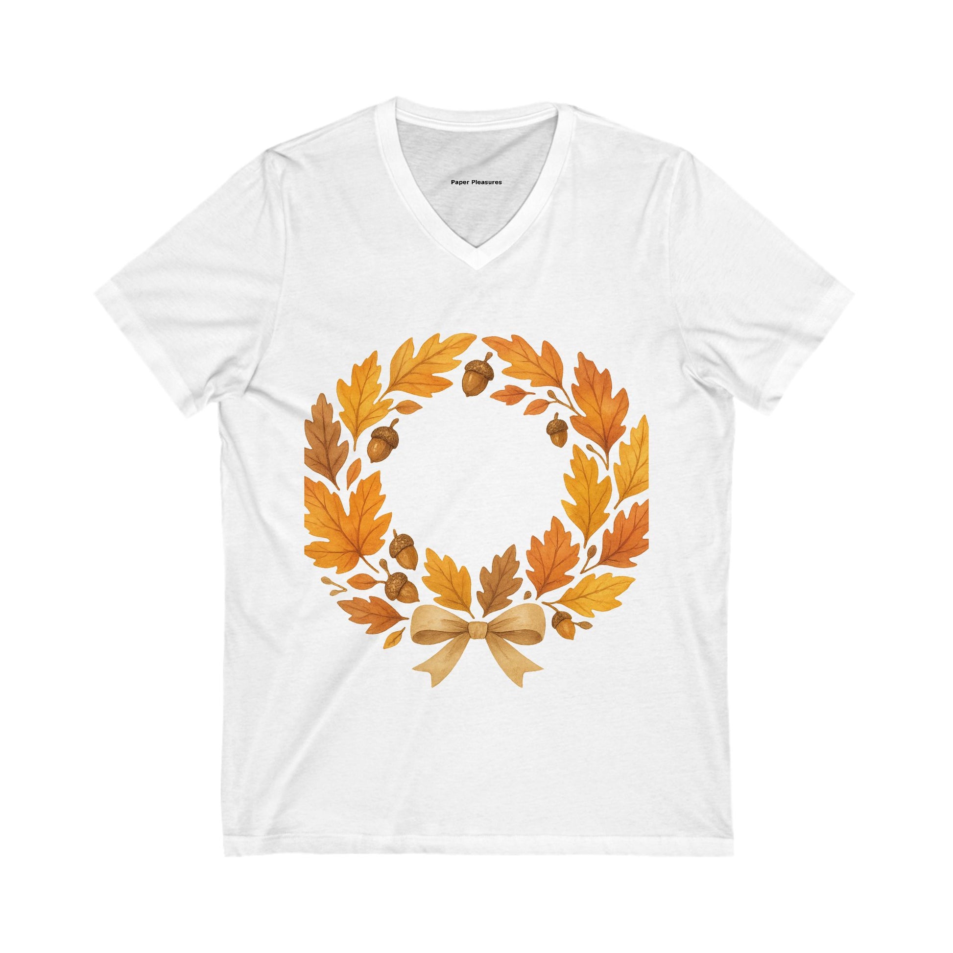 White t-shirt with autumn leaf design on a white background