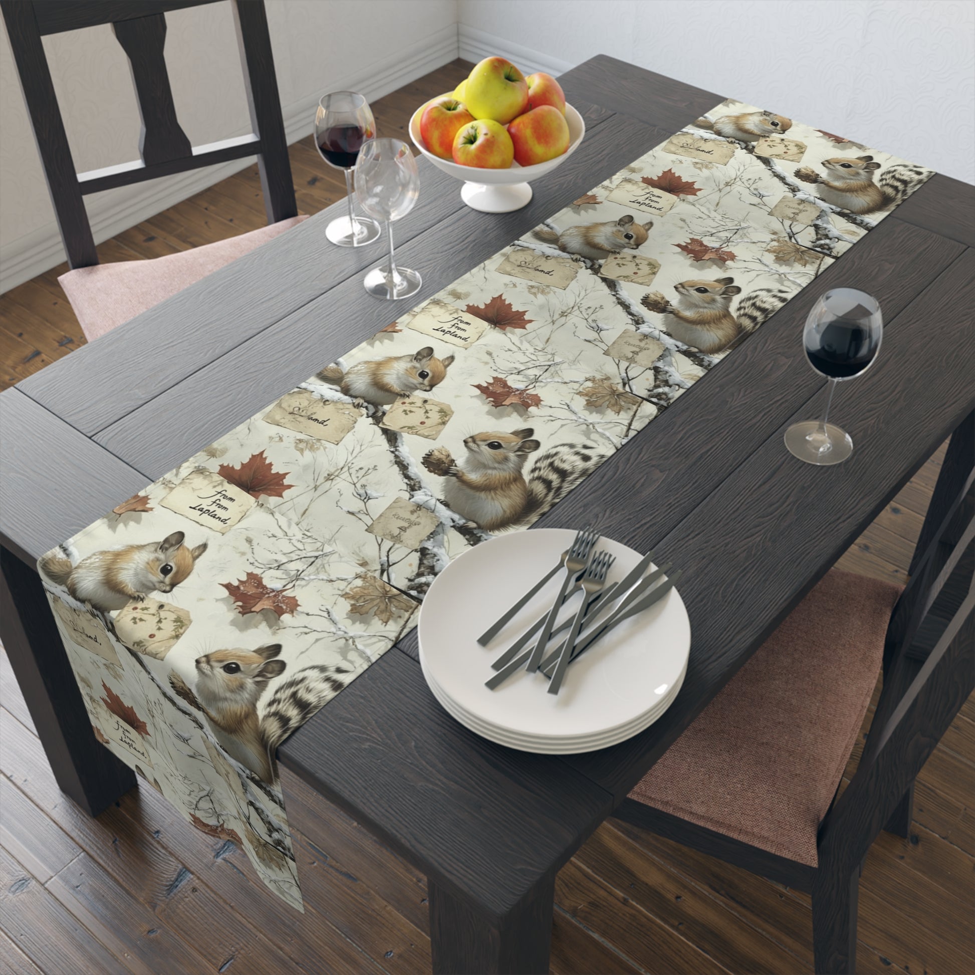 Dining table runner with a squirrel-themed images.